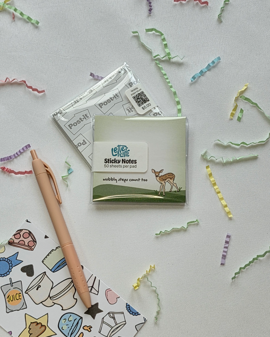 Wobbly Steps Count Too deer illustrated sticky note pad shown in packaging