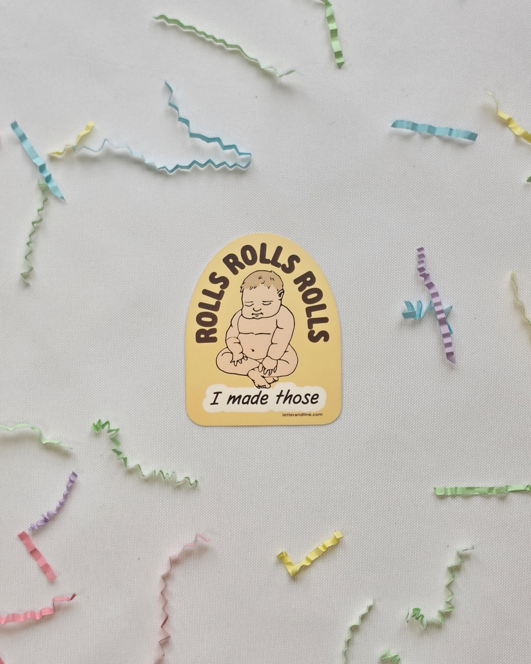 Rolls Rolls Rolls I Made Those new parent milestone sticker flat lay with scattered colorful paper strips