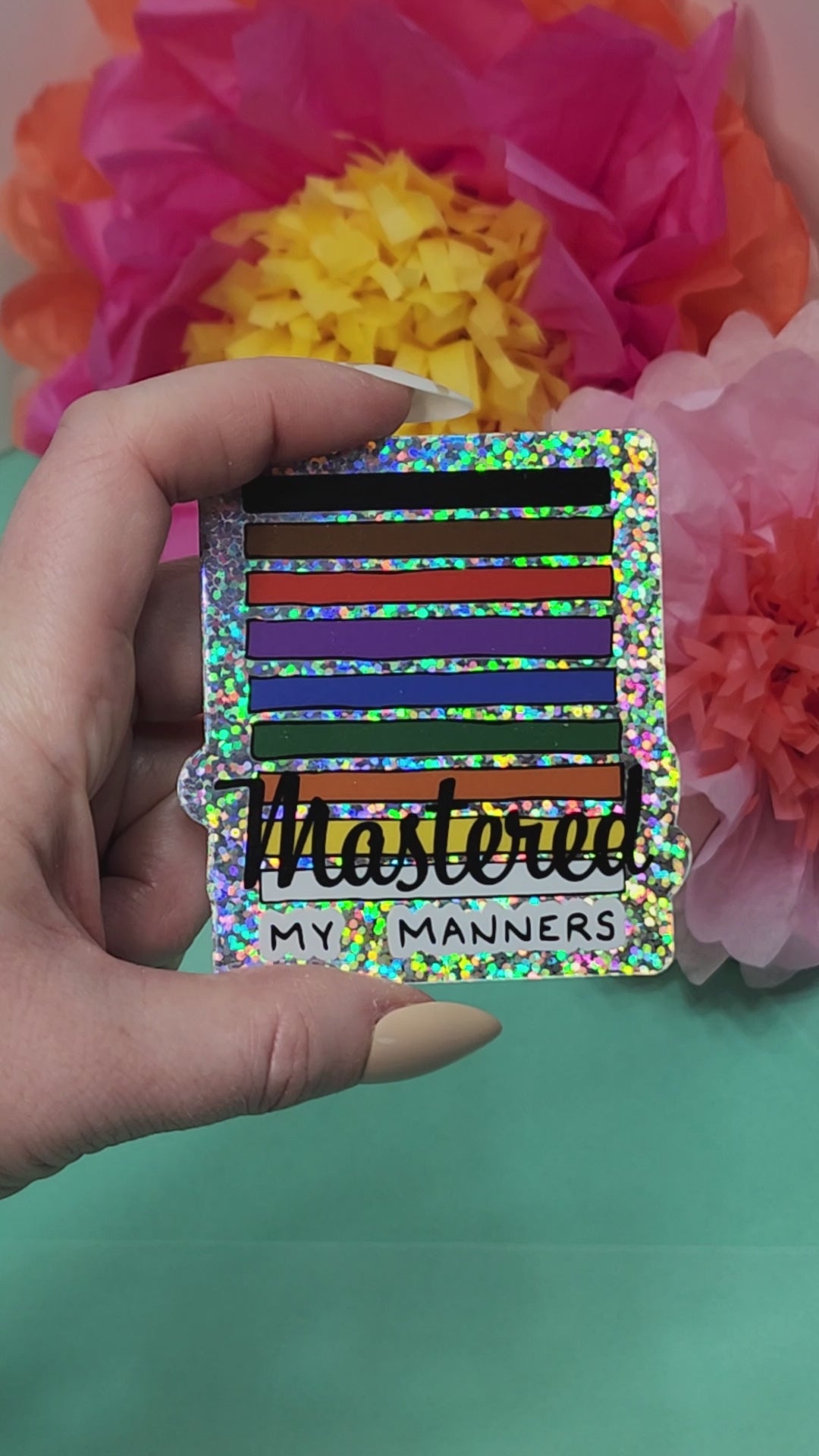 video showing sparkly finish of the mastered my manners sticker