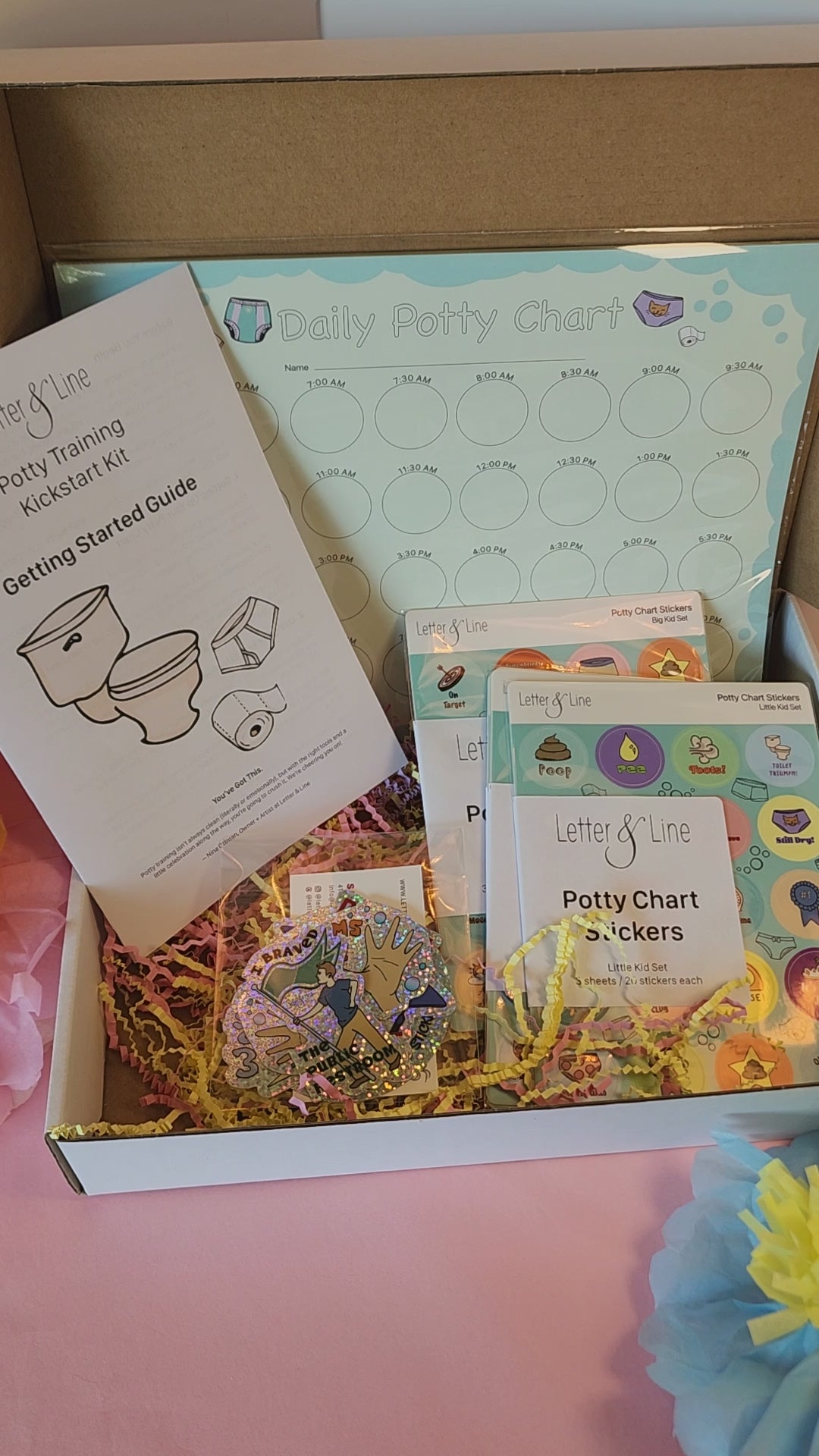 Video tour of the Potty Training Kickstart Kit with chart, stickers, and printed guide inside.