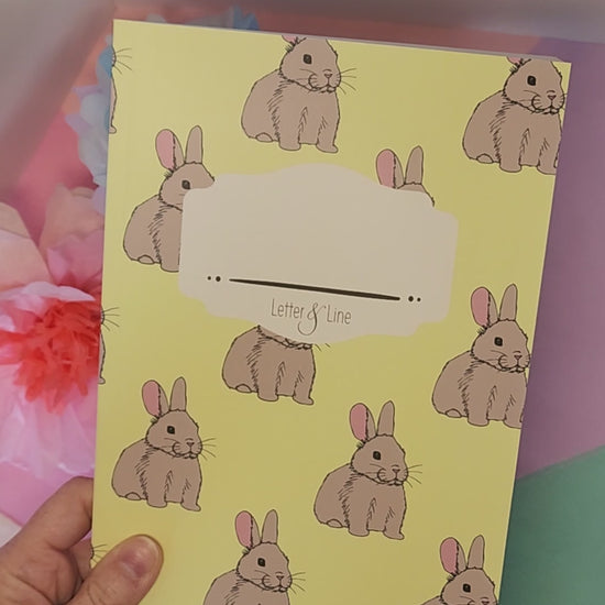Video of bunny notebook covers and interior pages.